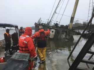 work crew and Coast Guard personnel on board