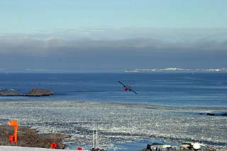 passengers for Punta Arenas in groups 1 and 2 please line up Chilean Air Force Twin Otter landing on the glacier