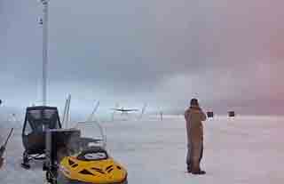 LARISSA Twin Otter lands on the glacier