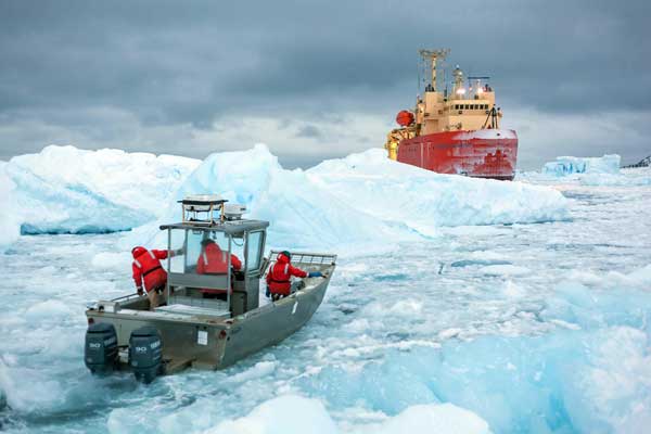 LMG in heavy sea icerigid-hull boat heads to the LMG to pick up samples