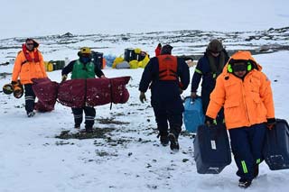 hauling gear to the helicopter