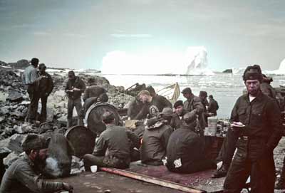 Seabees having a meal at their picnic table